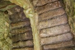 The corbelled roof of the well house