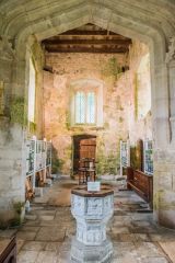The font and tower arch