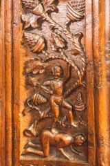 Bench end of a boy standing on another's back