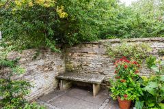 A small exterior garden seat