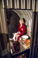 Sitting out an air raid in an Anderson Shelter