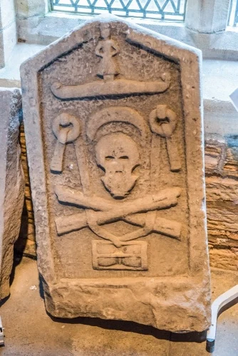 A 15th-century cross slab in the porch