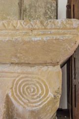 Spiral and doogtooth carving, chancel arch respond