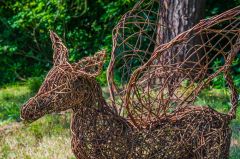 Amusing wicker sculptures dot the garden