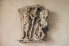 A worn Norman carving