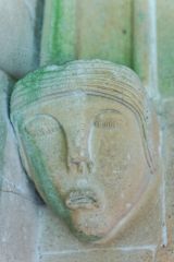 A carved head outside the south door