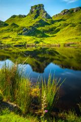 Castle Ewen reflected in a lochan