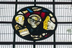 A roundel of medieval glass fragments