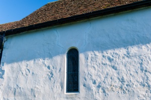 Norman lancet in the nave wall