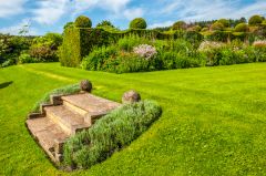 Formal lawns below the house