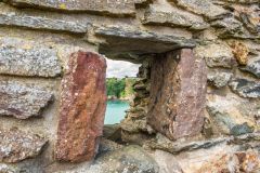 A small lancet window in the outer wall of the fort