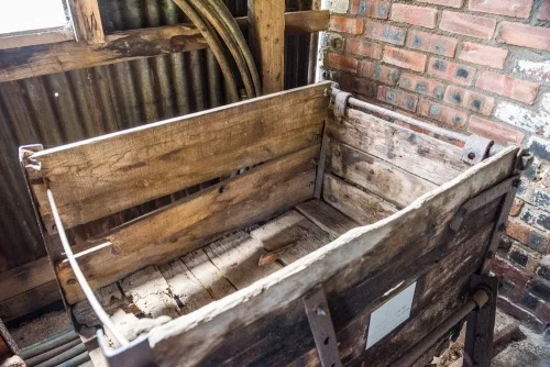 Ore cars inside the mine buildings
