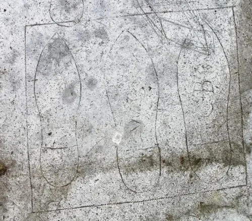 Victorian graffiti of feet, tower roof
