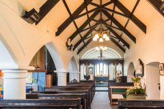 Looking east down the whitewashed nave