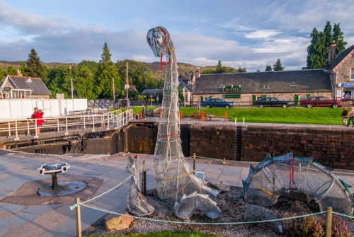 A Loch Ness Monster sculpture beside the canal