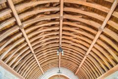 The beautiful barrel-vaulted church ceiling