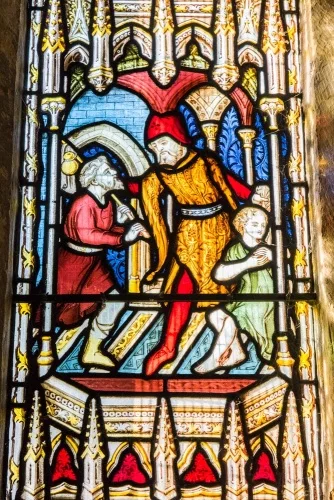 Scene from the Acts of Mercy window