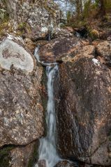 A quiet woodland waterfall