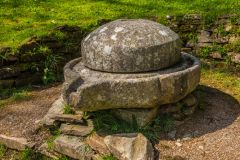 An ancient cider press in the gardens