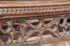One of the 15th century traceried pew backs