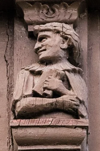 Carved figure, south facade