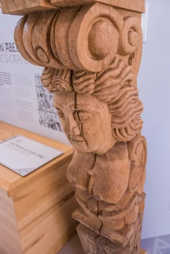 A caryatid figure being carved