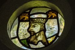 Medieval stained glass head of a king