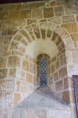 A deeply splayed Norman lancet window