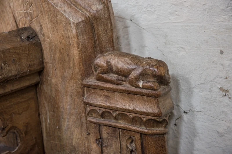 Medieval bench end carving of a dog