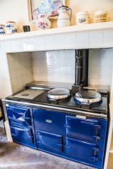 A gleaming stove in the kitchen
