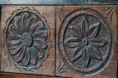Panelling carvings of flowers