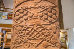 Rosemarkie Cross Slab, double disk and crescent carvings