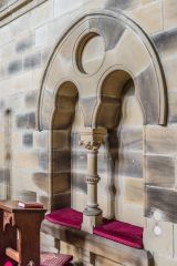 A two seat sedilia in the chancel