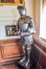 A coat of armour on the staircase landing