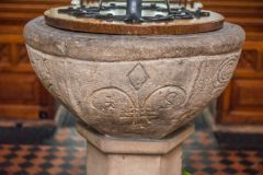 Haltwhistle, Holy Cross Church, Carving detail on the 17th century font