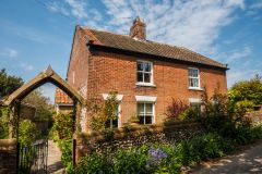 A typical Norfolk cottage near the church