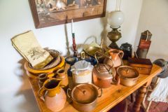 A crowded table in the kitchen