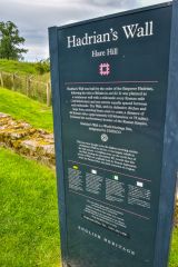 The English Heritage information panel at Hare Hill