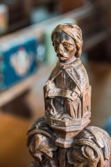 Late medieval carved bench end