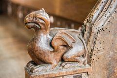 Medieval bench end of a dragon, St Lawrence Church