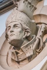 An archbishop's head carving in the nave