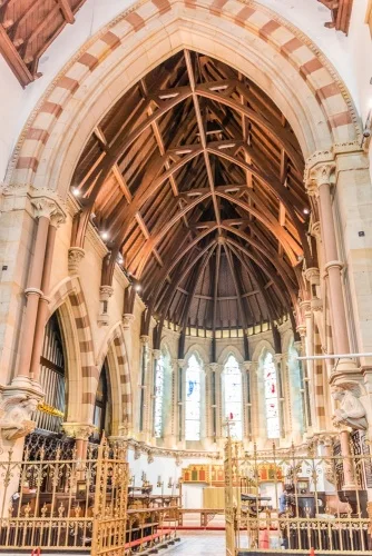 The chancel arch and Bodley's 'golden gates'