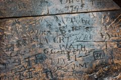 Centuries of schoolboy carved signatures