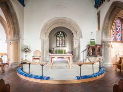The nave altar and Norman chancel arch