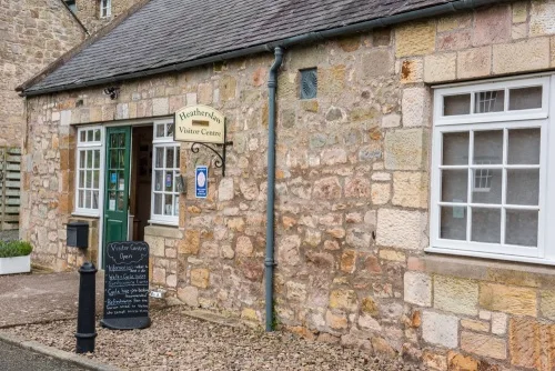 A restored mill building, now a tourist information centre