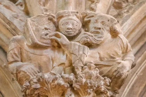 The quarrelling couple carving on the sedilia