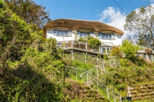 Another thatched cottage, near the village stores