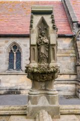 A richly carved 19th century monument in the churchyard
