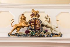 The gilded royal coat of arms