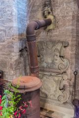 A Victorian church stove and Georgian monument